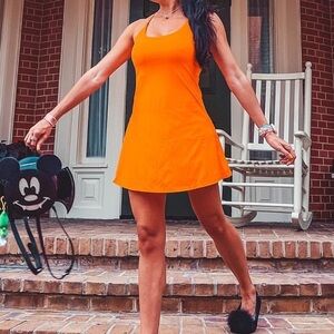 Women’s bright orange halara dress with shorts attached